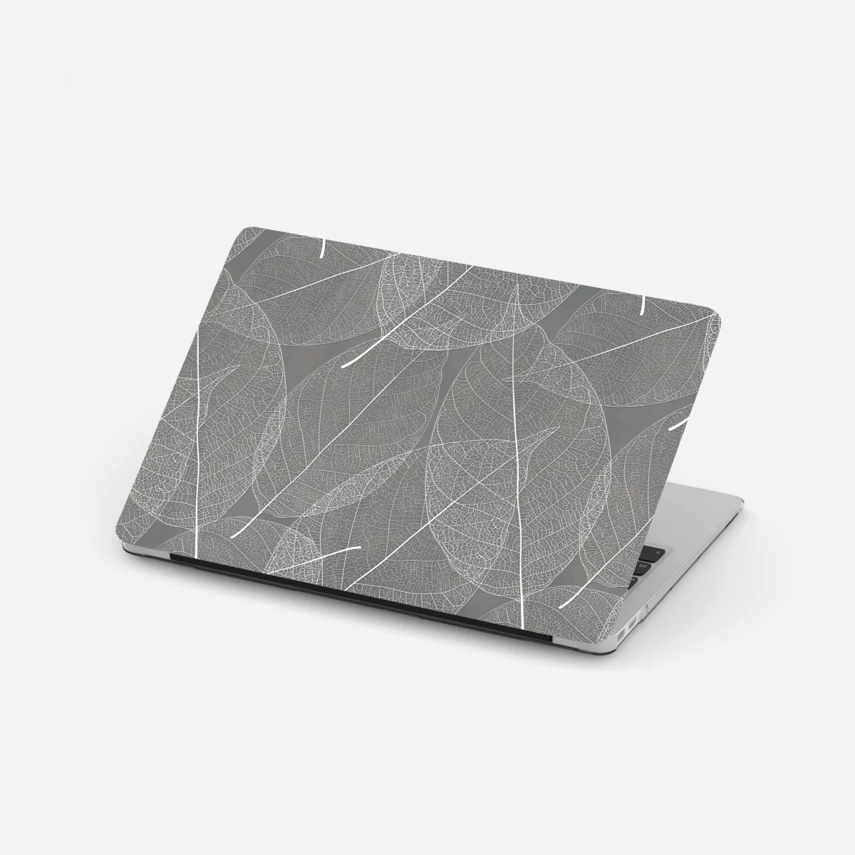 Adesivo per laptop motivo di foglie scheletrate su sfondo grigio • Wallissimo® Adesivo per laptop motivo di foglie scheletrate su sfondo grigio • Wallissimo®