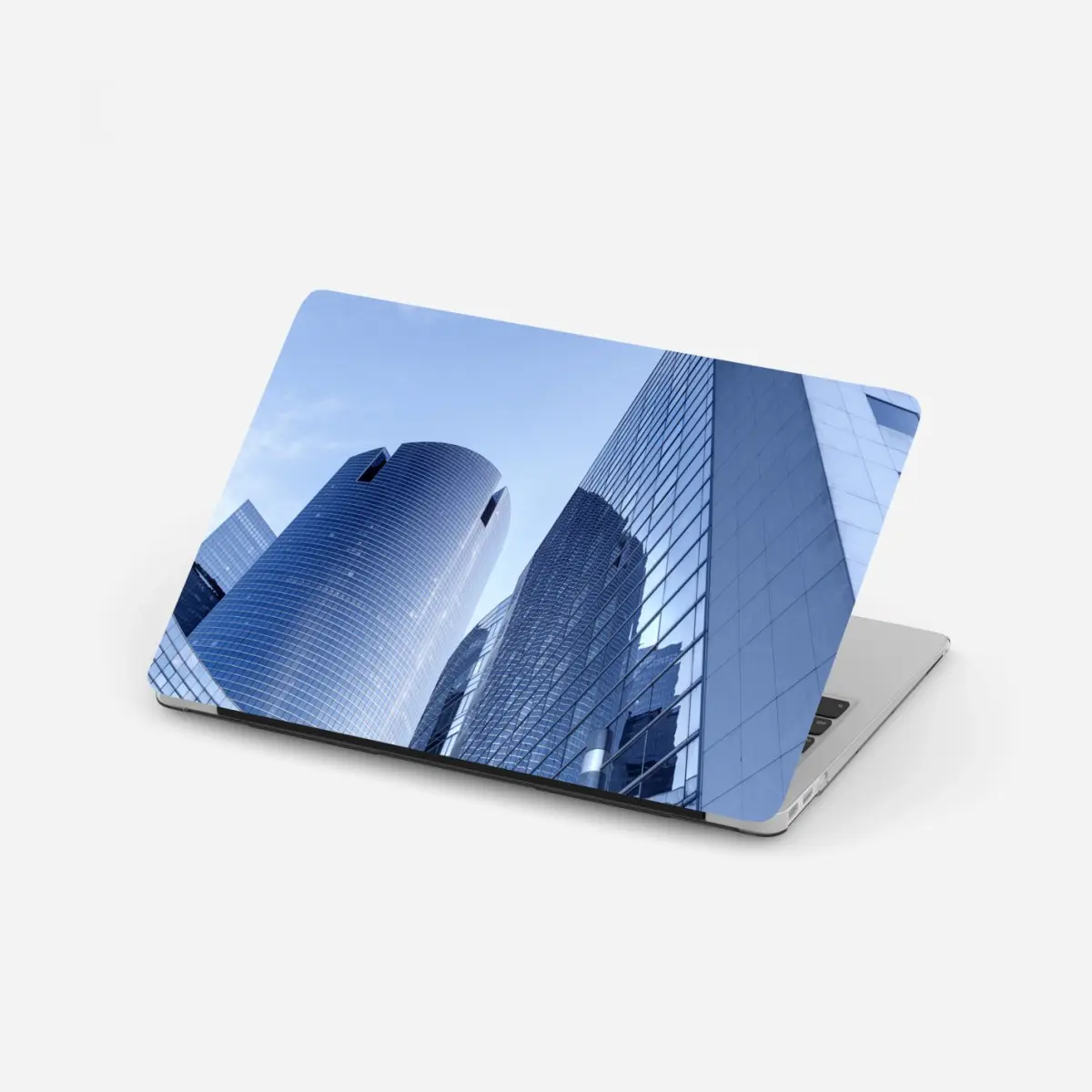 Adesivo per laptop riflessi urbani nell'architettura moderna • Wallissimo®