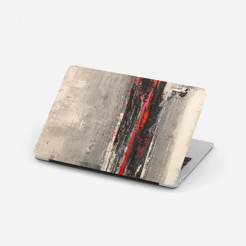 Adesivo per laptop flusso rosso su superfici grigie