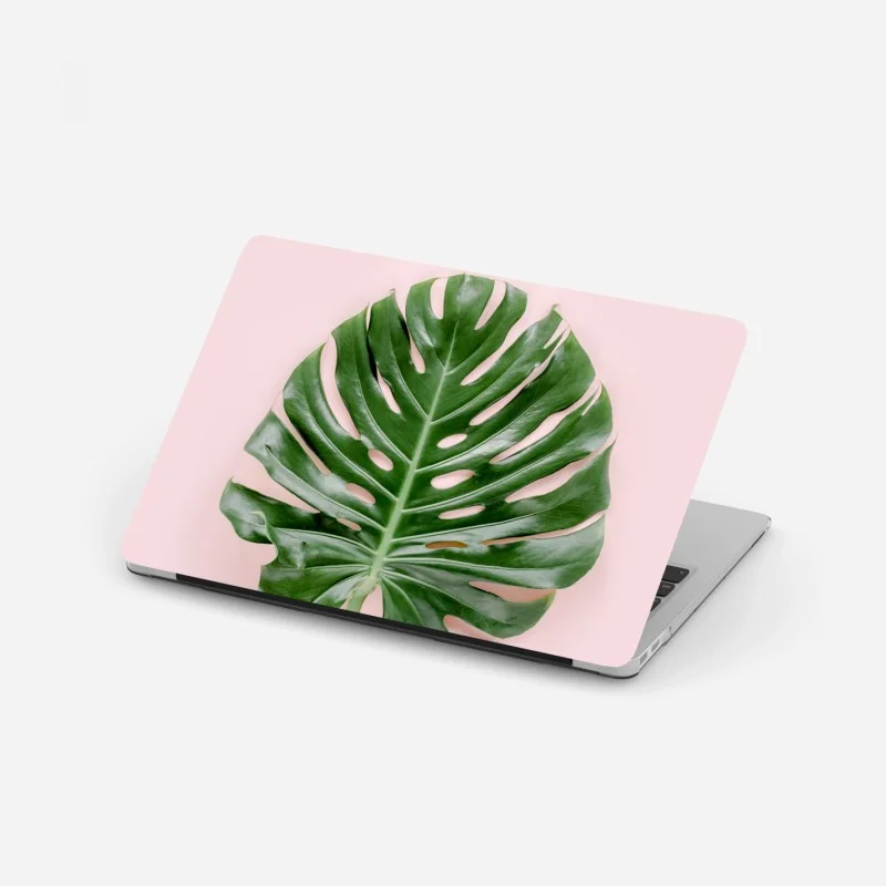 Adesivo per laptop foglia di monstera su sfondo rosa pastello