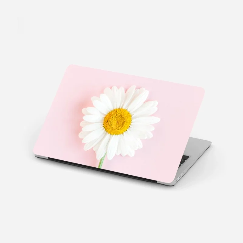 Adesivo per laptop margherita su sfondo rosa pastello