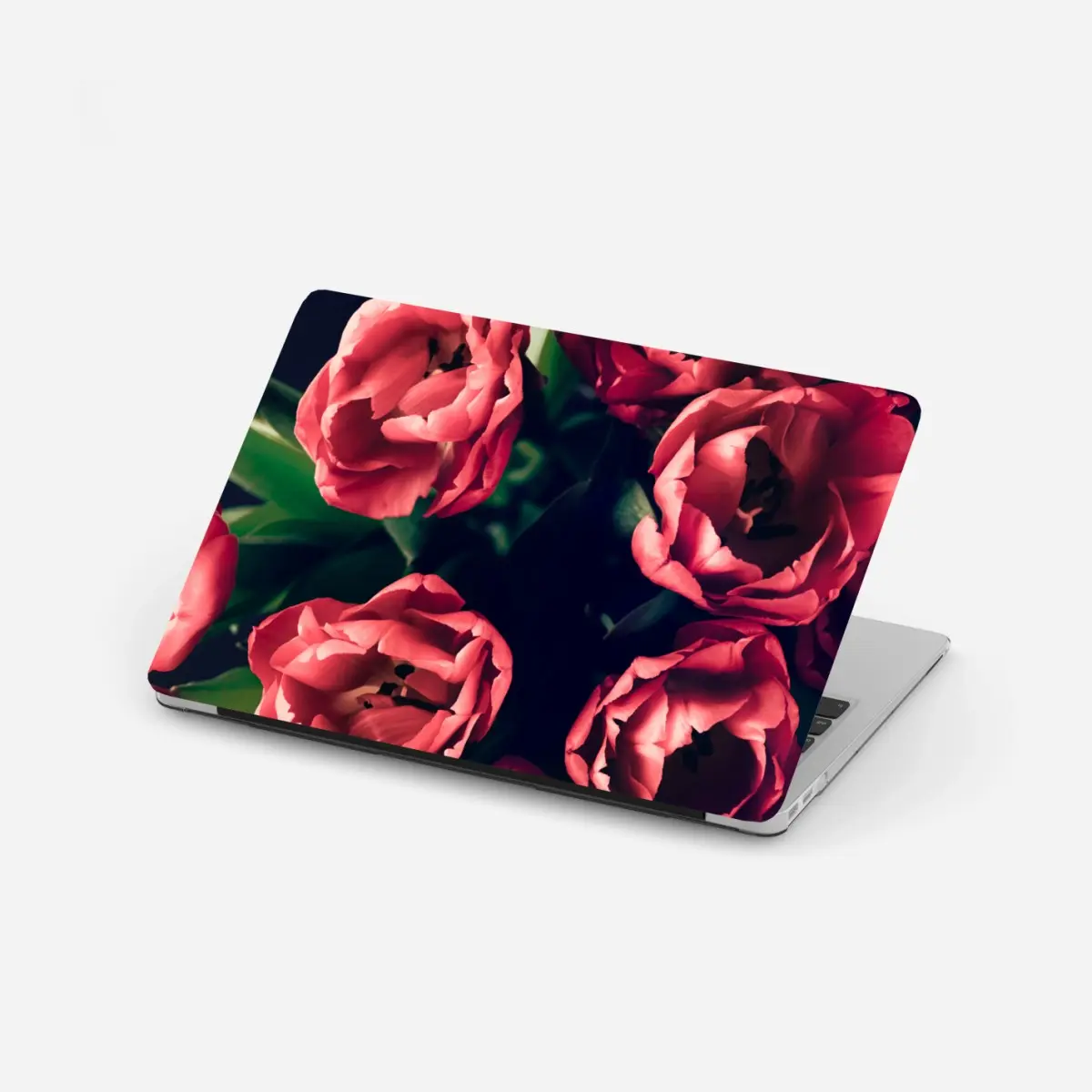 Adesivo per laptop mazzo di tulipani rosa su sfondo scuro • Wallissimo®