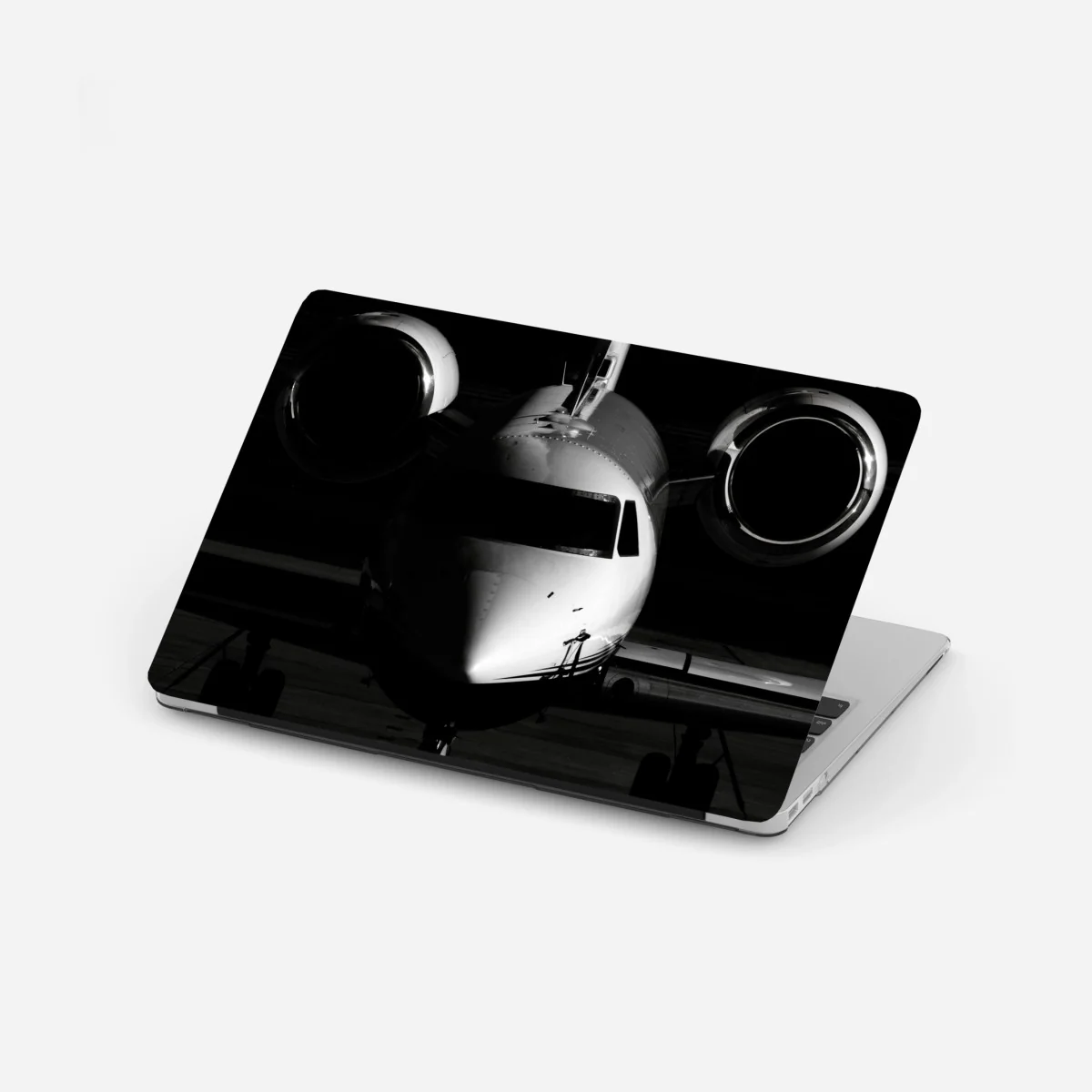 Adesivo per laptop jet privato in controluce - silhouette elegante • Wallissimo® Adesivo per laptop jet privato in controluce - silhouette elegante • Wallissimo®
