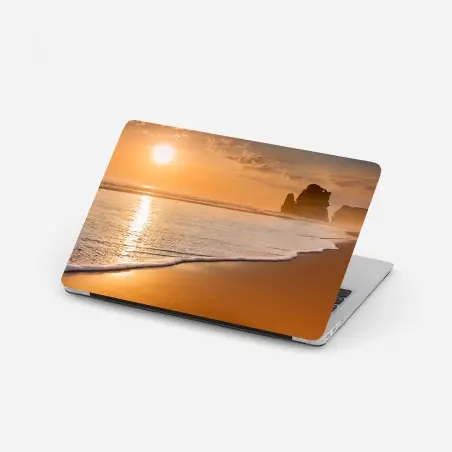 Adesivo per laptop tramonto dorato sulla costa • Wallissimo®