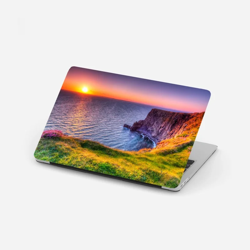 Adesivo per laptop tramonto sulle scogliere dorate