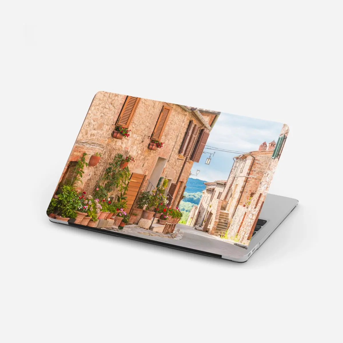 Adesivo per laptop borgo medievale fiorito in Toscana • Wallissimo®