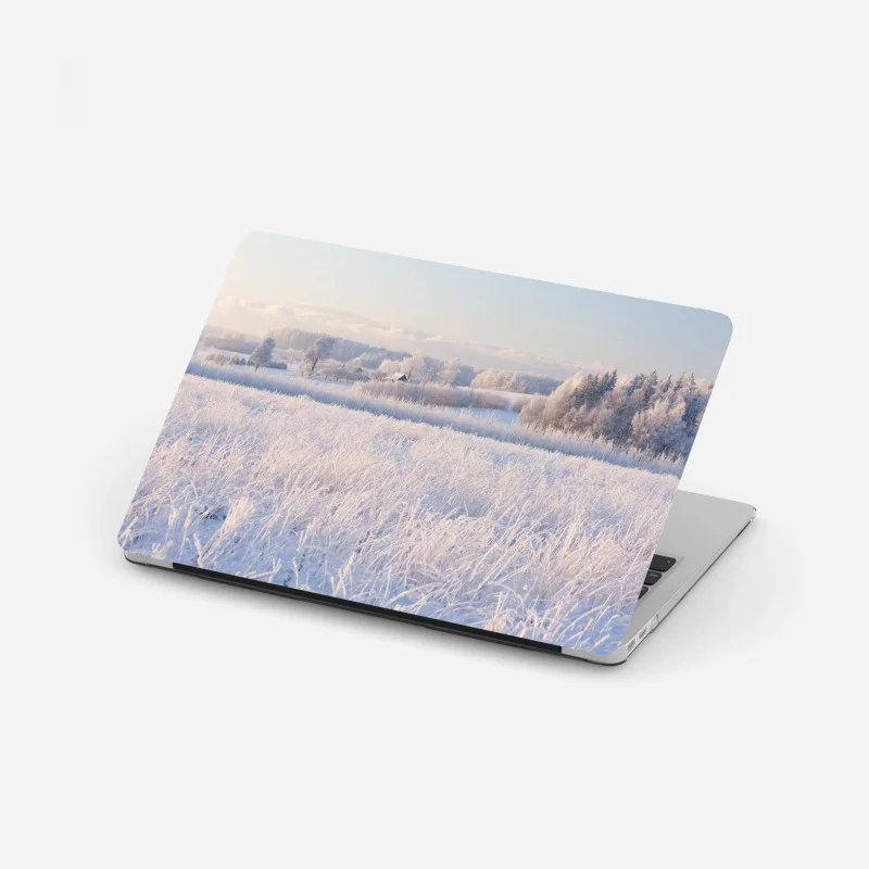 Adesivo per laptop alba invernale sulla campagna ghiacciata