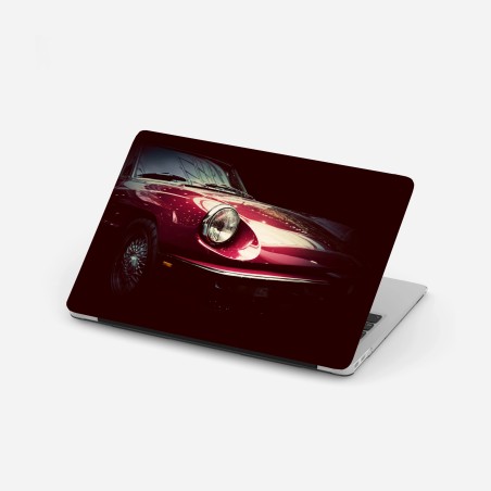 Adesivo per laptop eleganza retrò: dettaglio di auto d'epoca rossa • Wallissimo®