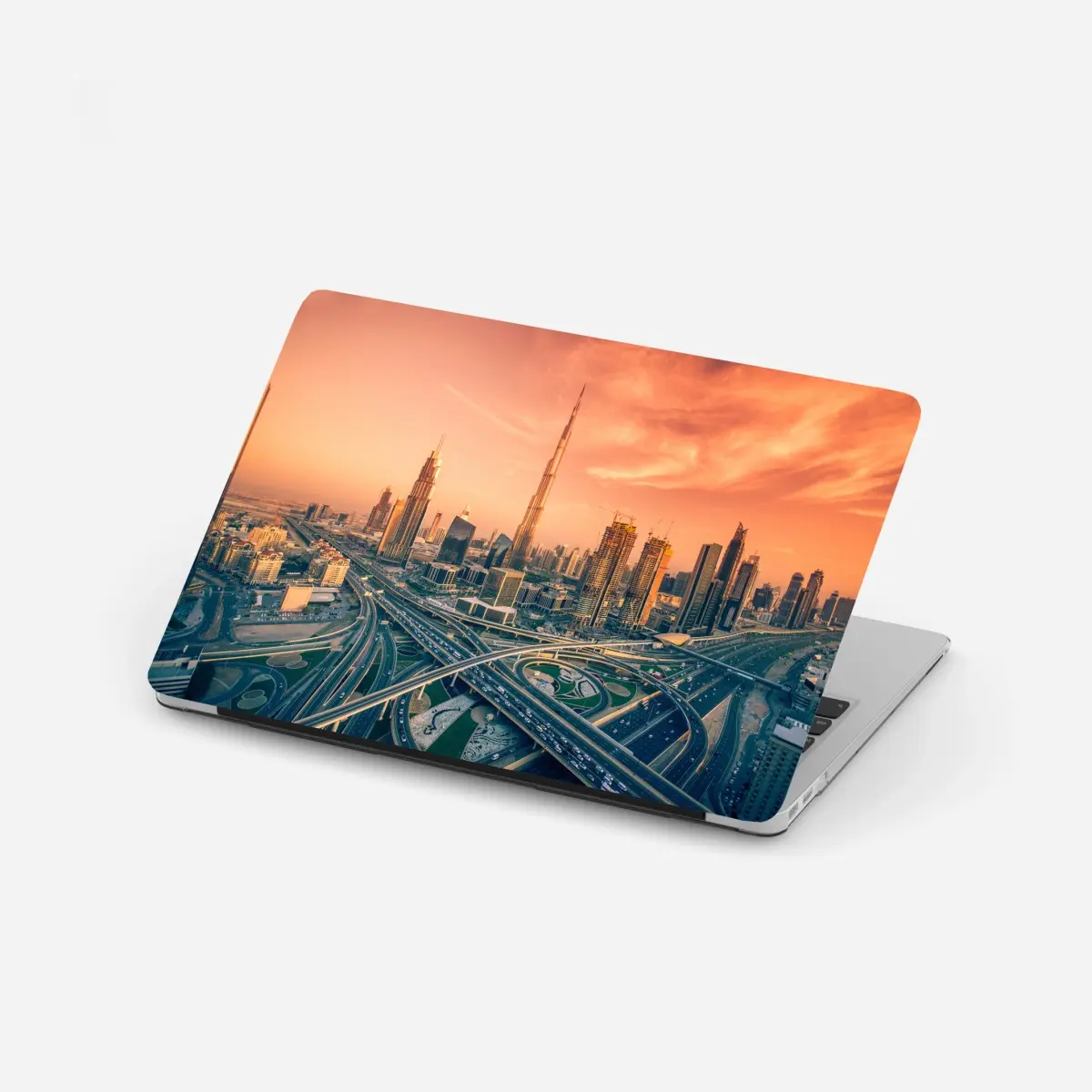 Adesivo per laptop panorama urbano di Dubai al tramonto • Wallissimo®