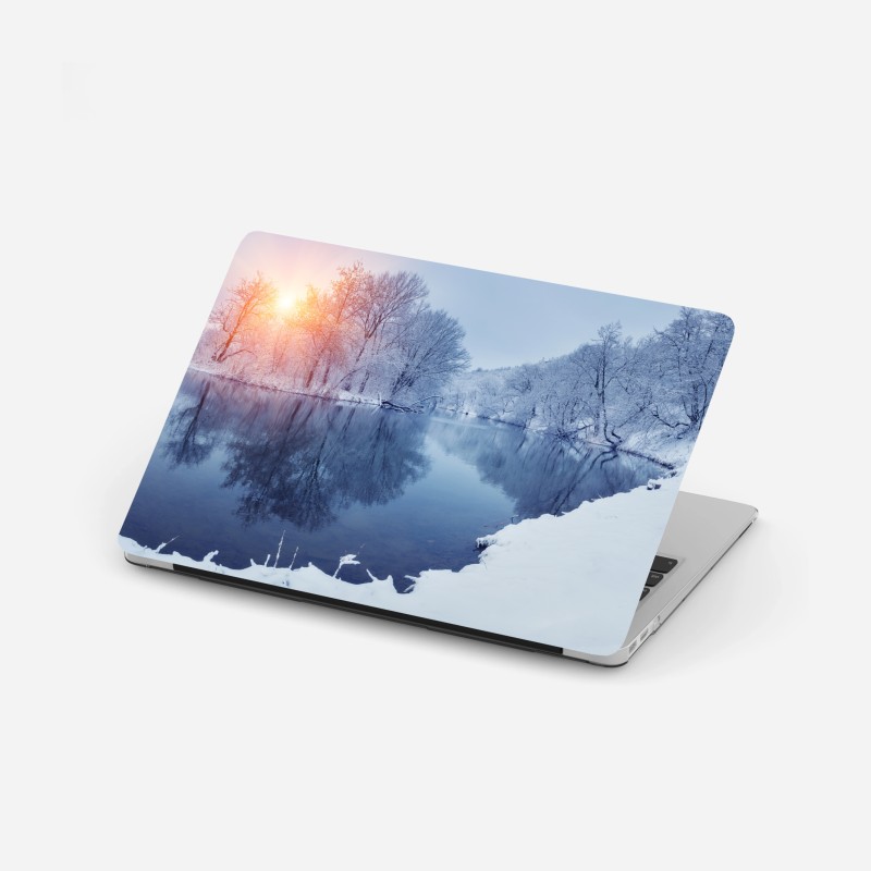 Adesivo per laptop tramonto invernale sul fiume ghiacciato