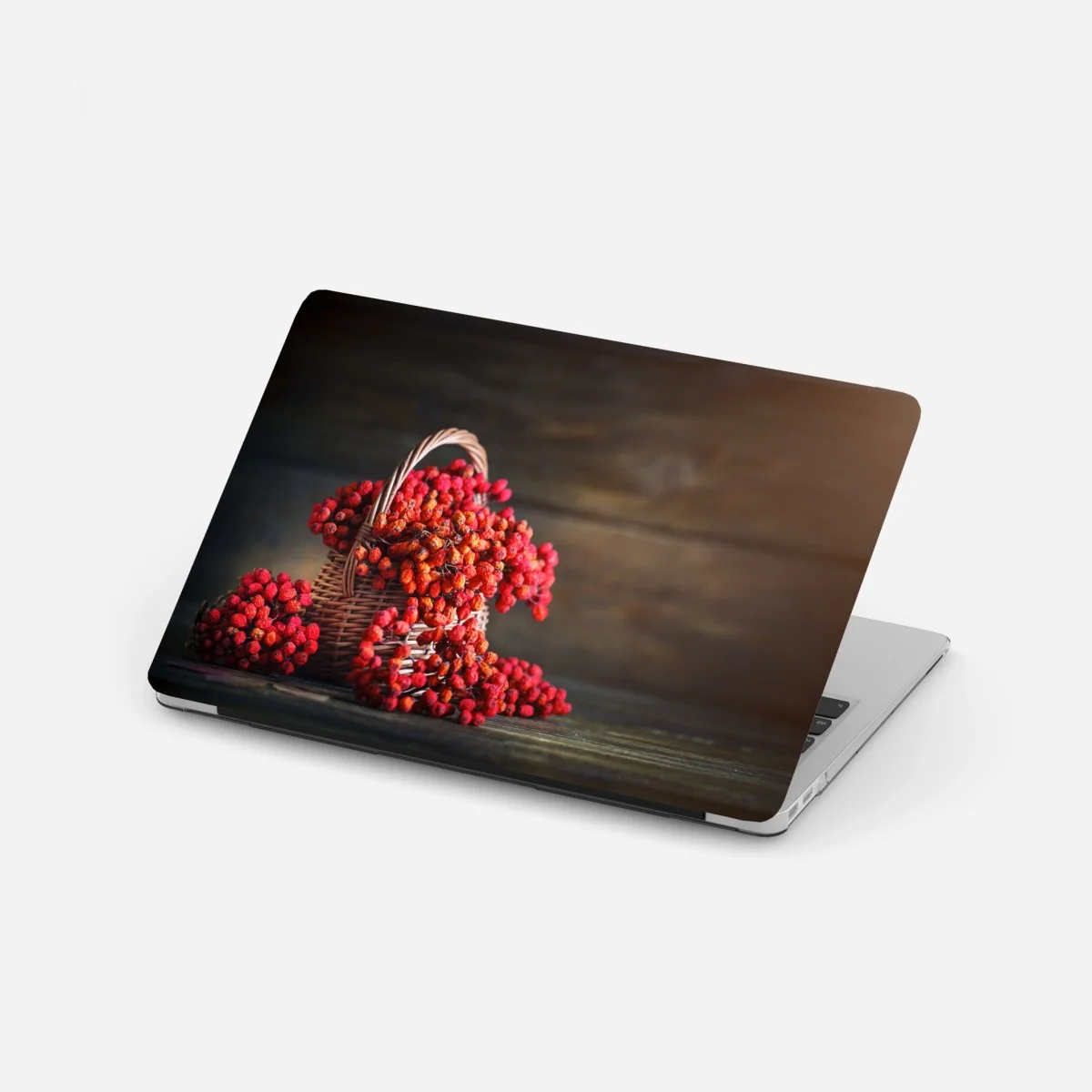 Adesivo per laptop composizione di bacche rosse su sfondo rustico • Wallissimo® Adesivo per laptop composizione di bacche rosse su sfondo rustico • Wallissimo®