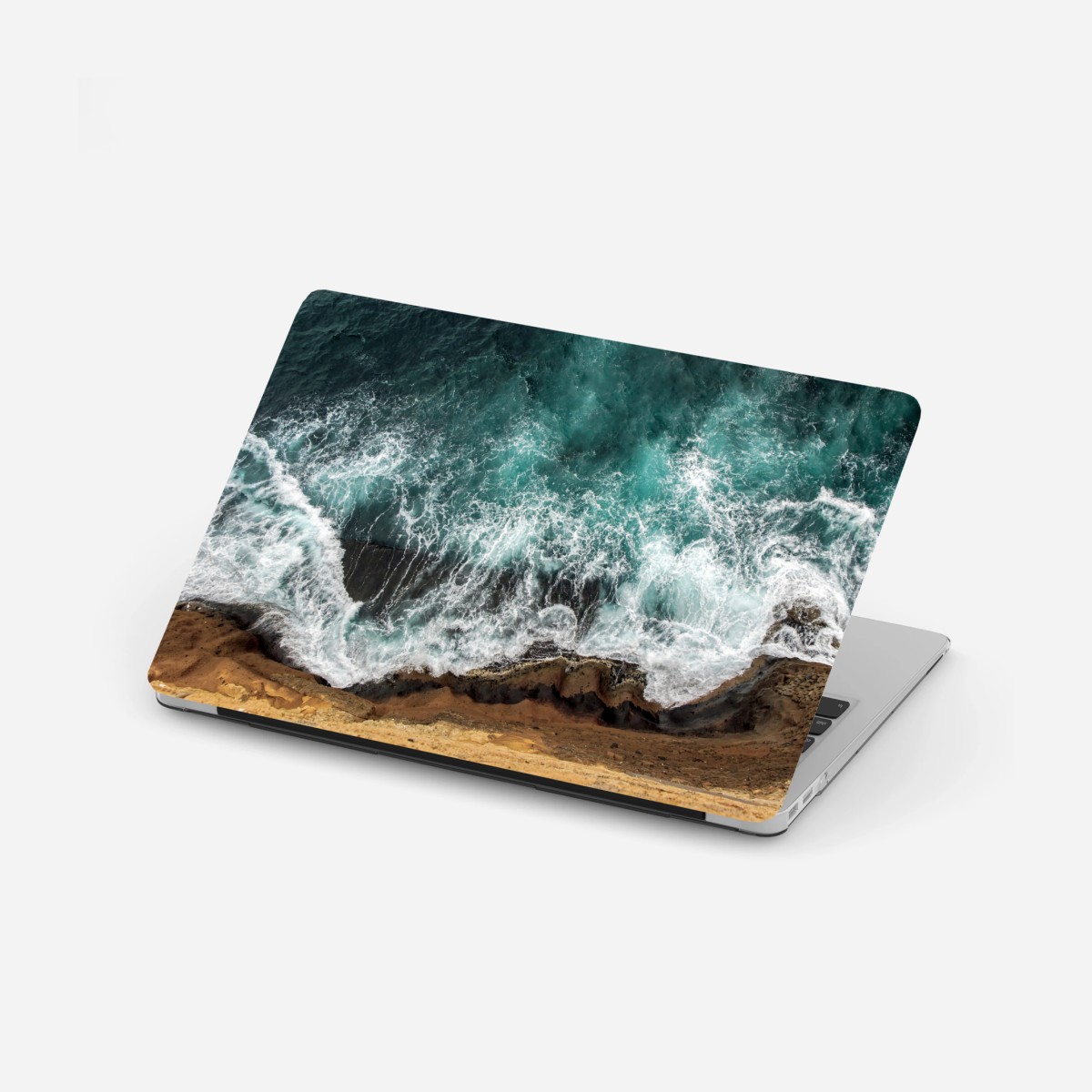 Adesivo per laptop vista aerea della scogliera e del mare turchese • Wallissimo®