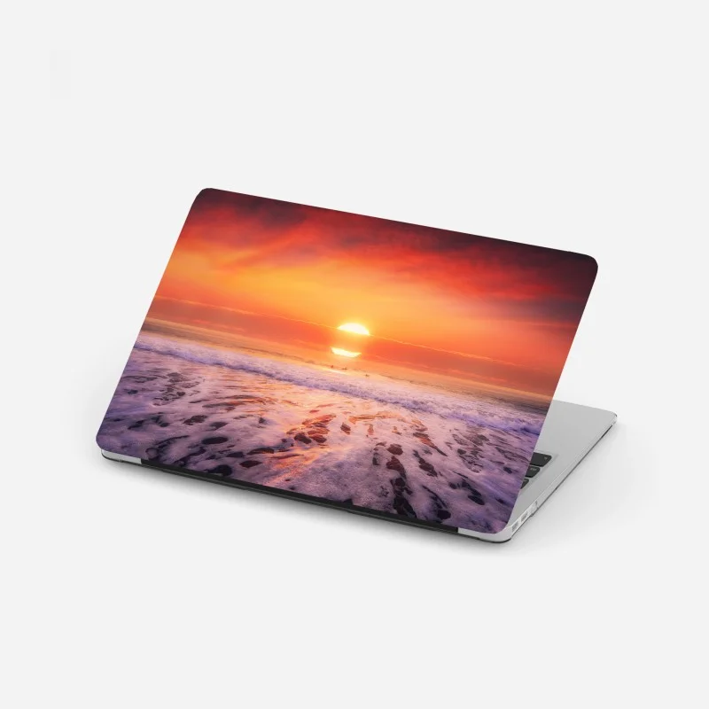 Adesivo per laptop tramonto dorato sulla spiaggia
