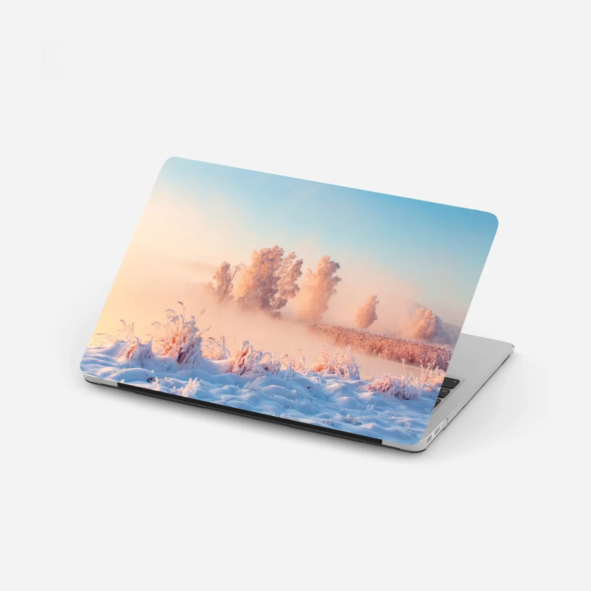Adesivo per laptop alba rosa su paesaggio innevato • Wallissimo® Adesivo per laptop alba rosa su paesaggio innevato • Wallissimo®