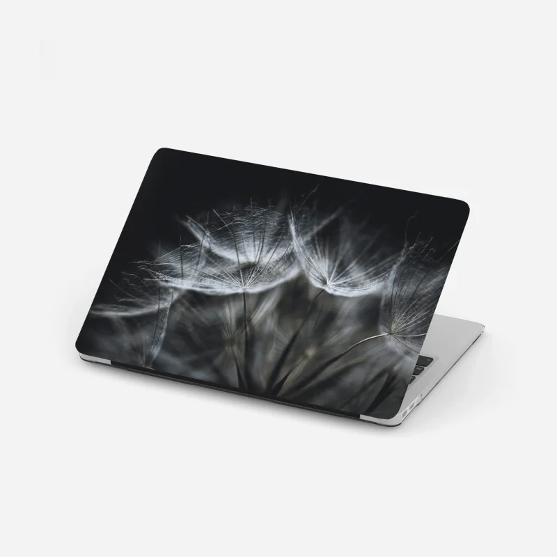 Adesivo per laptop soffione in macro: leggerezza e dettagli