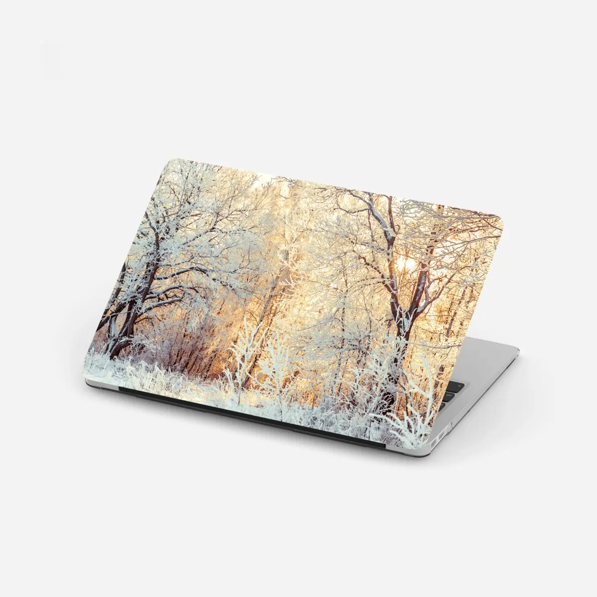 Adesivo per laptop incanto invernale al tramonto • Wallissimo®