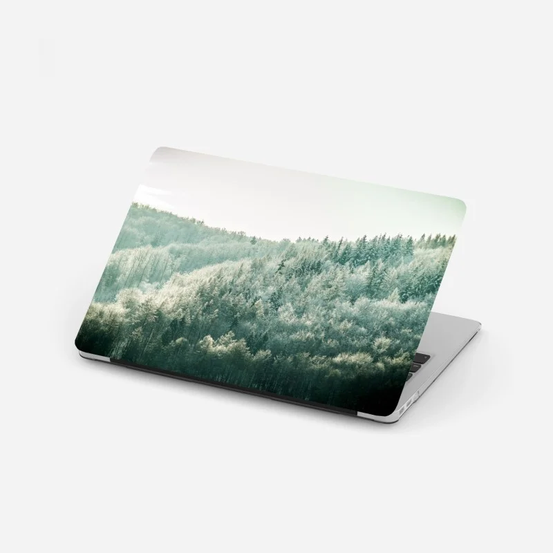 Adesivo per laptop silenzio luminoso della foresta innevata