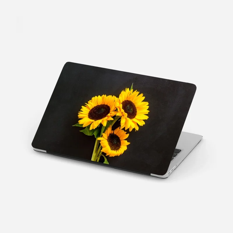 Adesivo per laptop girasoli su sfondo scuro