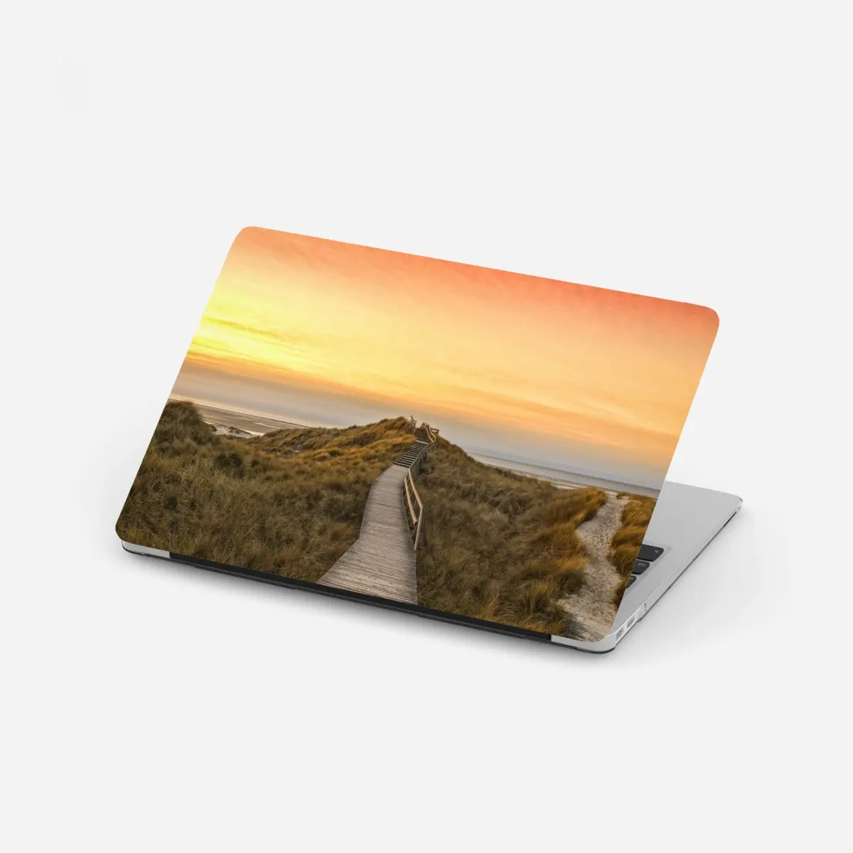 Adesivo per laptop passerella tra le dune di Norddorf al tramonto • Wallissimo®