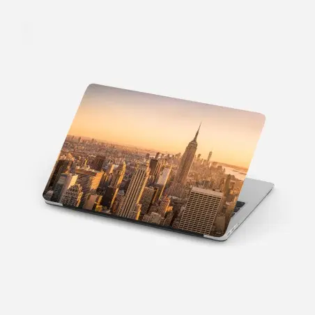 Adesivo per laptop skyline di New York al tramonto dorato • Wallissimo®