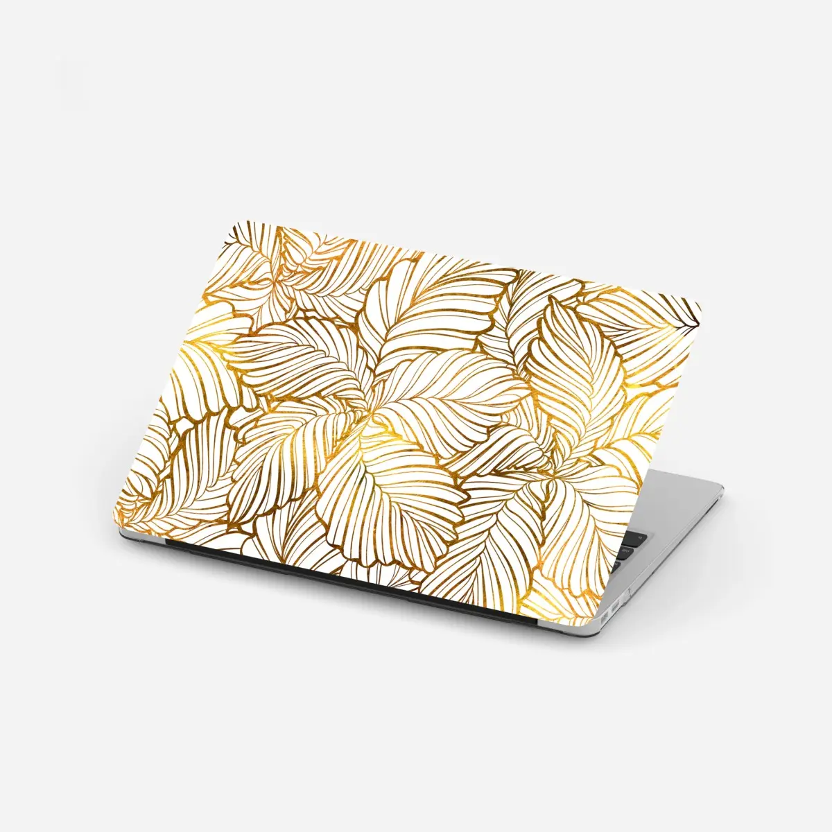 Adesivo per laptop motivo di foglie dorate su sfondo bianco • Wallissimo® Adesivo per laptop motivo di foglie dorate su sfondo bianco • Wallissimo®