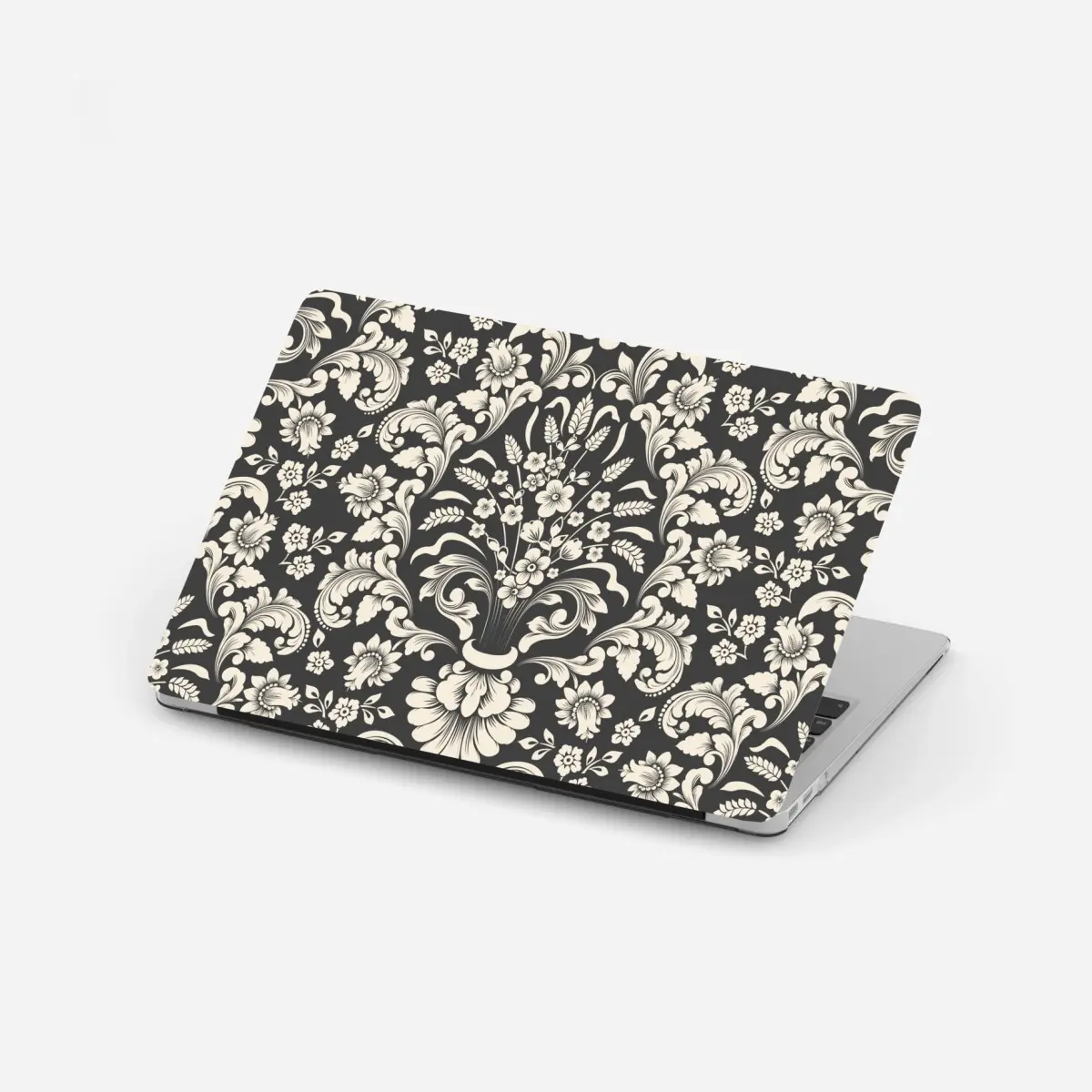 Adesivo per laptop motivo damascato floreale elegante su sfondo scuro • Wallissimo®