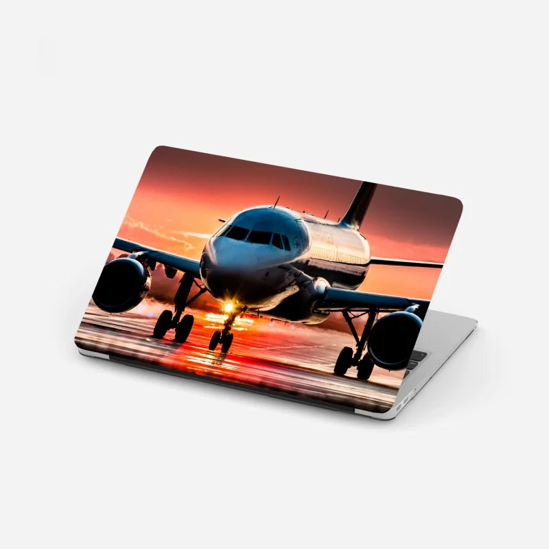 Adesivo per laptop aereo in pista al tramonto