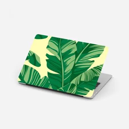 Adesivo per laptop motivo foglie tropicali verdi su sfondo giallo • Wallissimo®