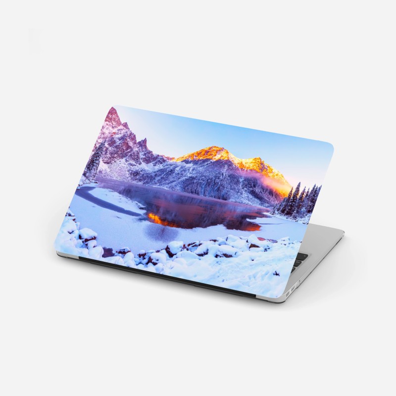 Adesivo per laptop alba dorata sulle Alpi innevate
