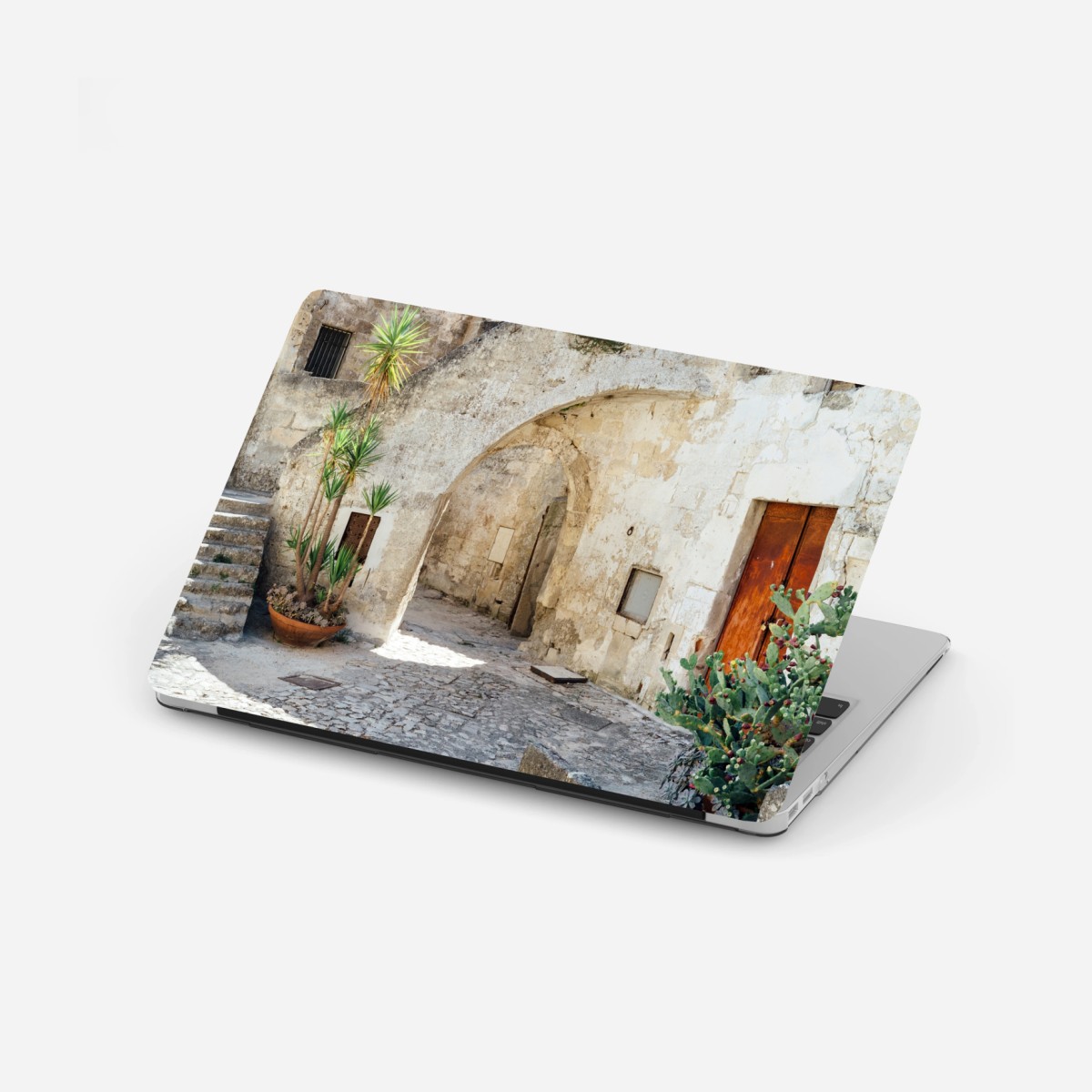 Adesivo per laptop angolo mediterraneo in pietra • Wallissimo®