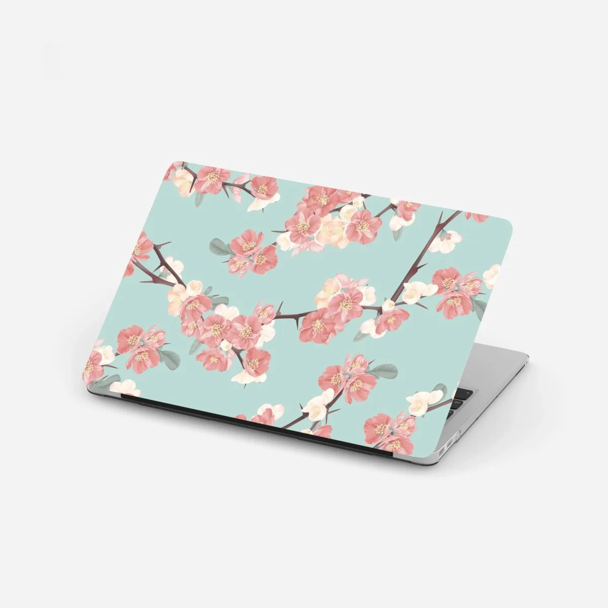 Adesivo per laptop motivo fiorito di ciliegio su sfondo turchese • Wallissimo® Adesivo per laptop motivo fiorito di ciliegio su sfondo turchese • Wallissimo®
