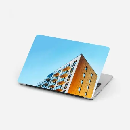 Adesivo per laptop facciata moderna con balconi su cielo azzurro • Wallissimo®