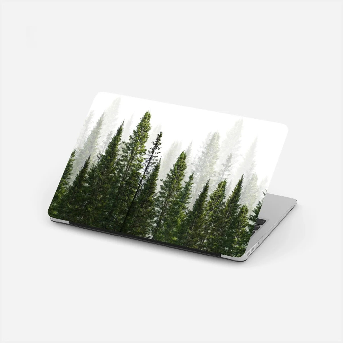 Adesivo per laptop foresta di abeti su sfondo bianco • Wallissimo® Adesivo per laptop foresta di abeti su sfondo bianco • Wallissimo®