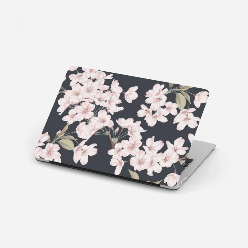 Adesivo per laptop rami di ciliegio in fiore su sfondo scuro