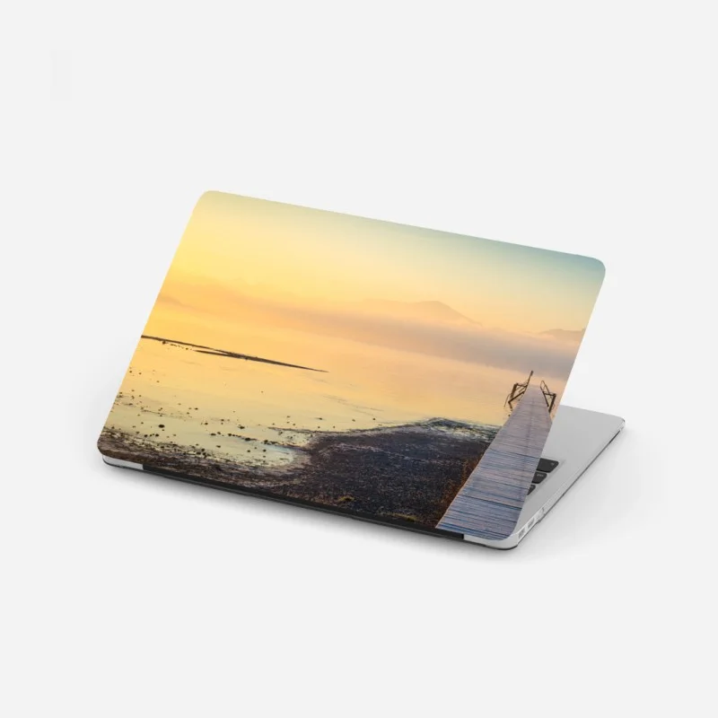 Adesivo per laptop pontile verso l'orizzonte al tramonto