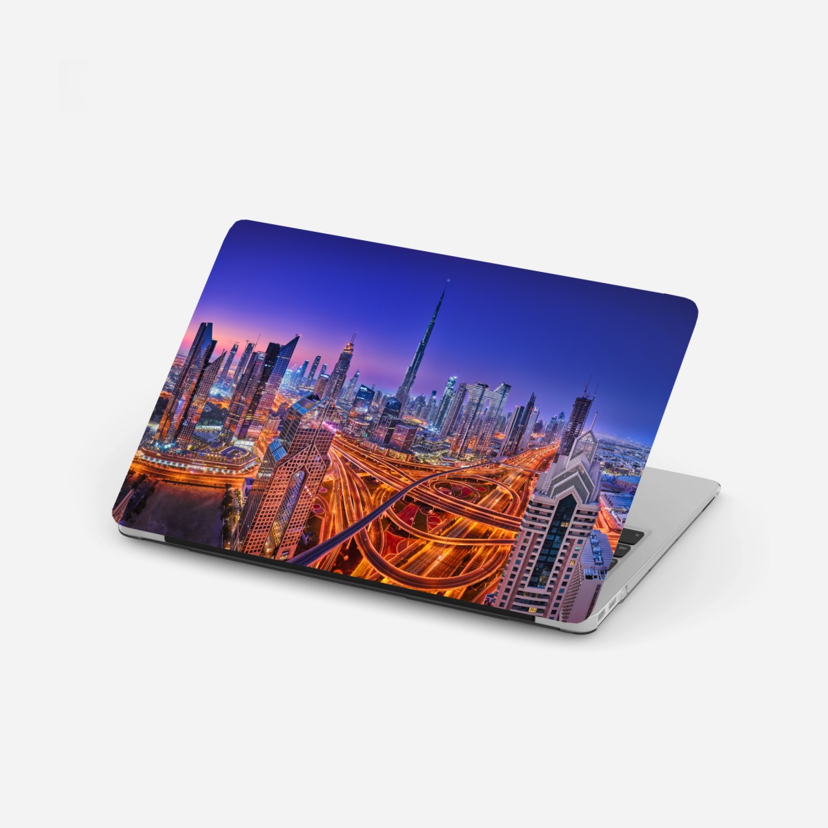 Adesivo per laptop panorama notturno di Dubai: skyline moderno e dinamico • Wallissimo®