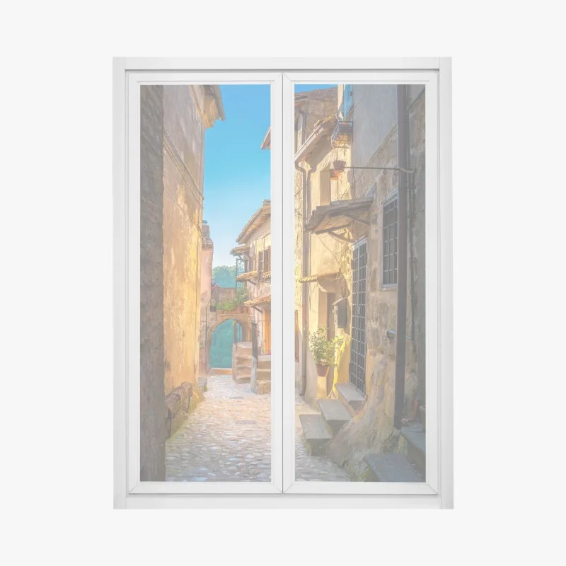 Adesivo per finestra vicoletto medievale in Toscana al tramonto