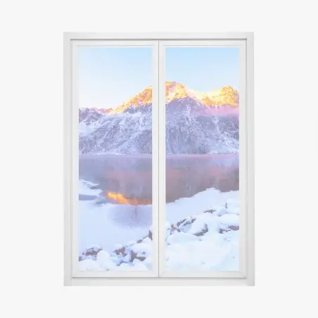 Adesivo per finestra alba dorata sulle Alpi innevate • Wallissimo®