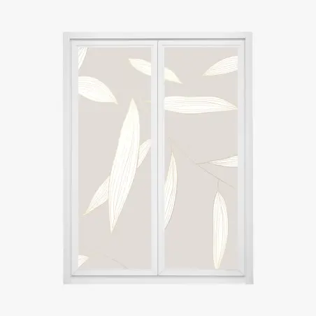 Adesivo per finestra motivo foglie dorate su sfondo beige • Wallissimo®