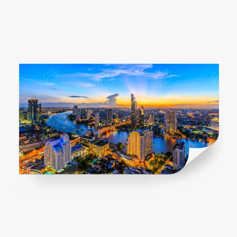 Carta da parati tramonto urbano sul fiume: skyline illuminato