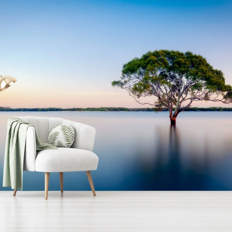 Carta da parati albero solitario sul lago al tramonto