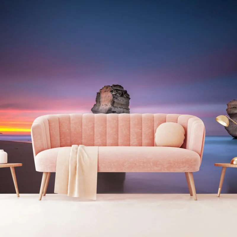 Carta da parati tramonto tra faraglioni sul mare