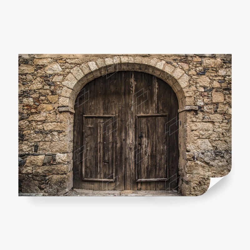 Carta da parati porta antica in legno su muro di pietra