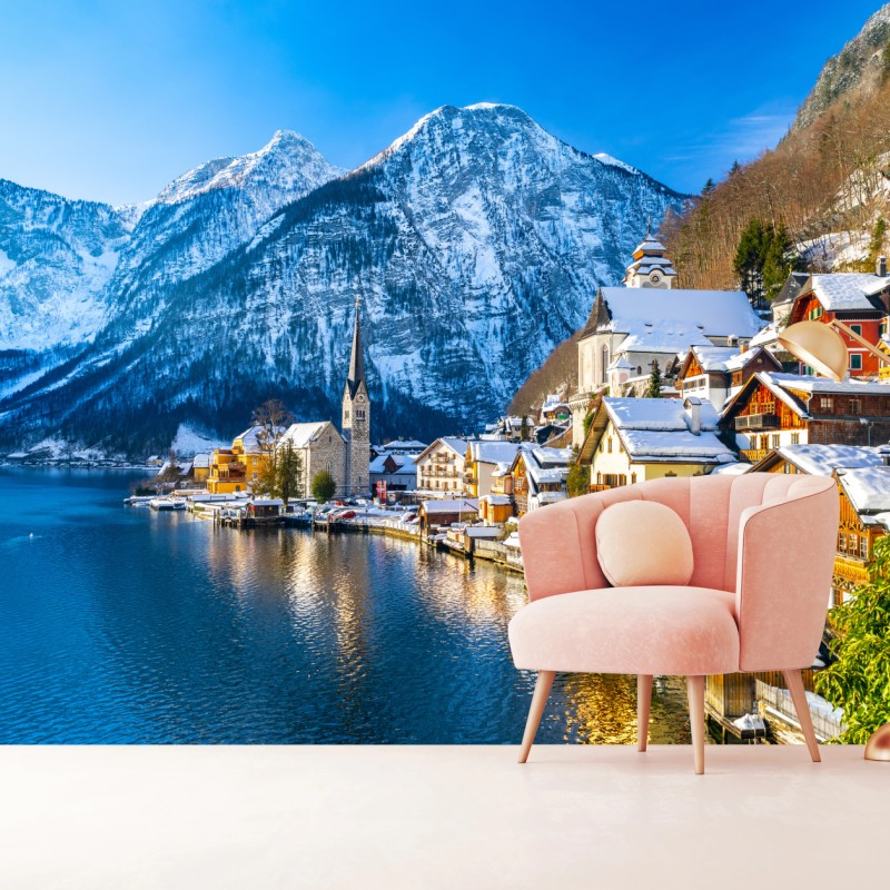 Carta da parati villaggio alpino sul lago innevato