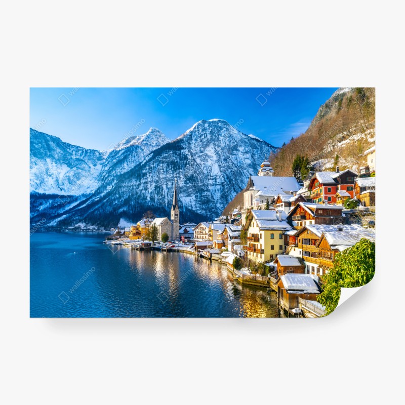 Carta da parati villaggio alpino sul lago innevato
