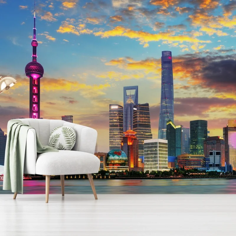 Carta da parati vista notturna della skyline di Shanghai al tramonto