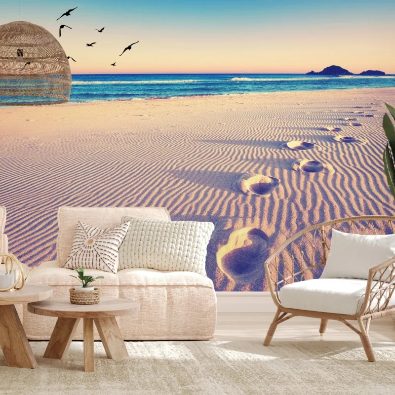 Carta da parati impronte magiche sulla spiaggia al tramonto