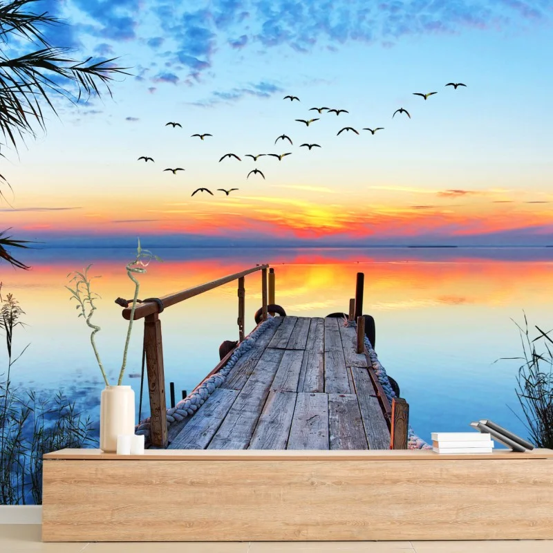 Carta da parati tramonto sul molo: vista serena sul lago