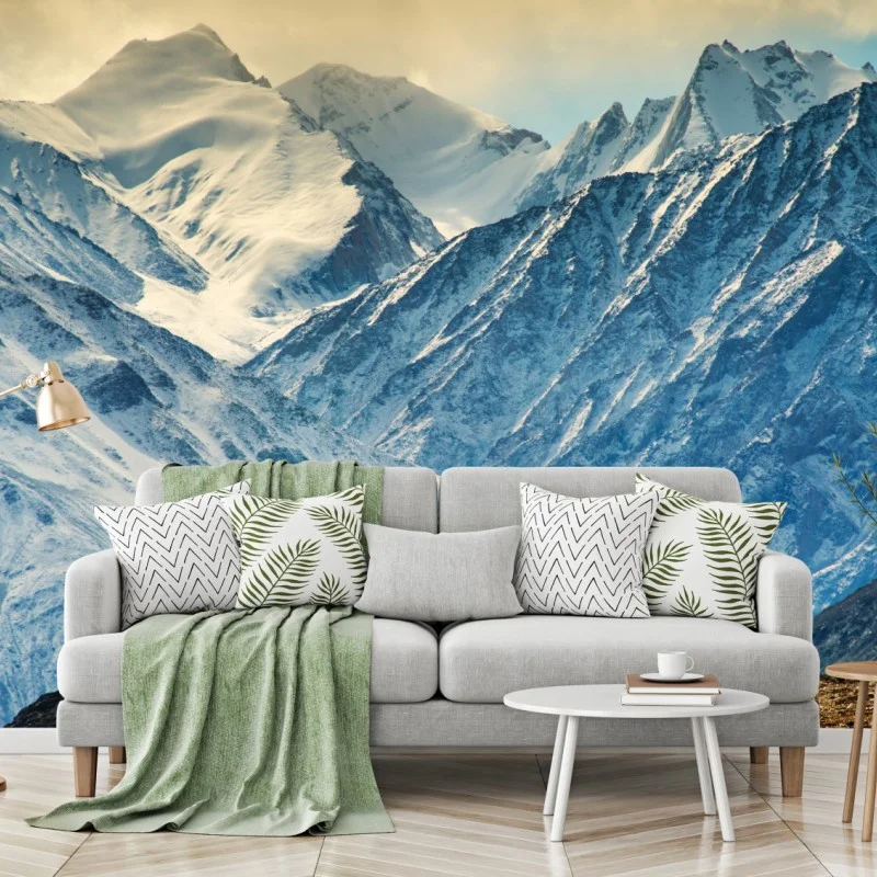 Carta da parati statua buddista sulle montagne innevate dell'Himalaya