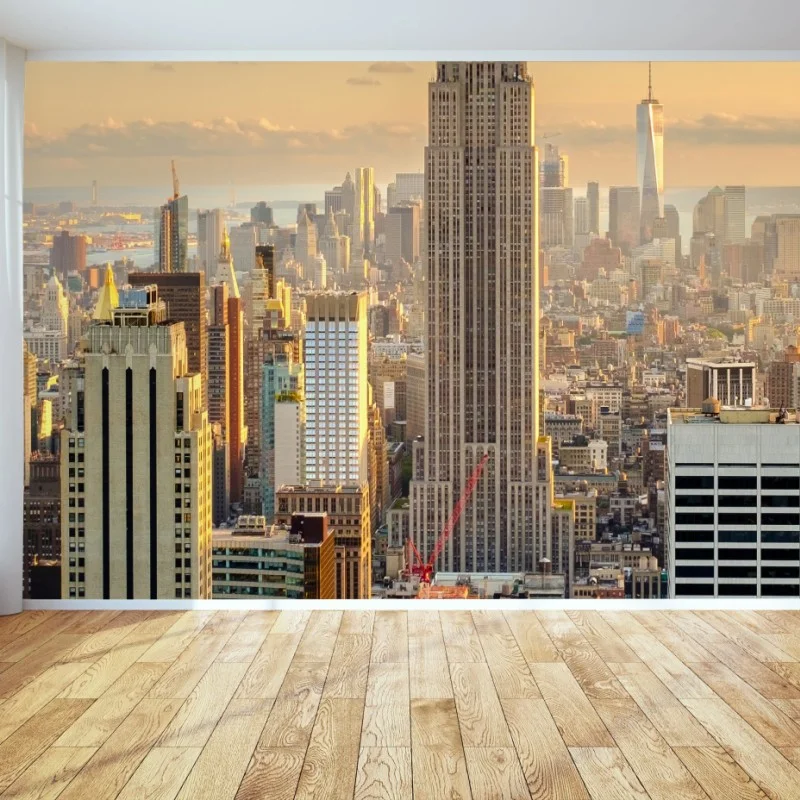 Carta da parati tramonto dorato su New York con Empire State Building